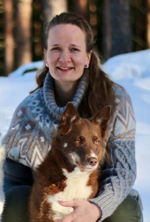 Eläinlääkäri Henna Kuosa koiransa kanssa